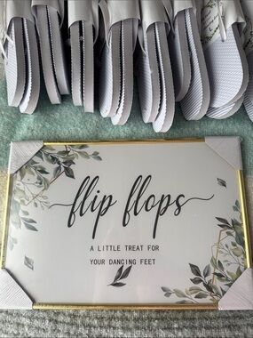 White Wedding Guest Flip Flops (35 pair) with 2 signs.